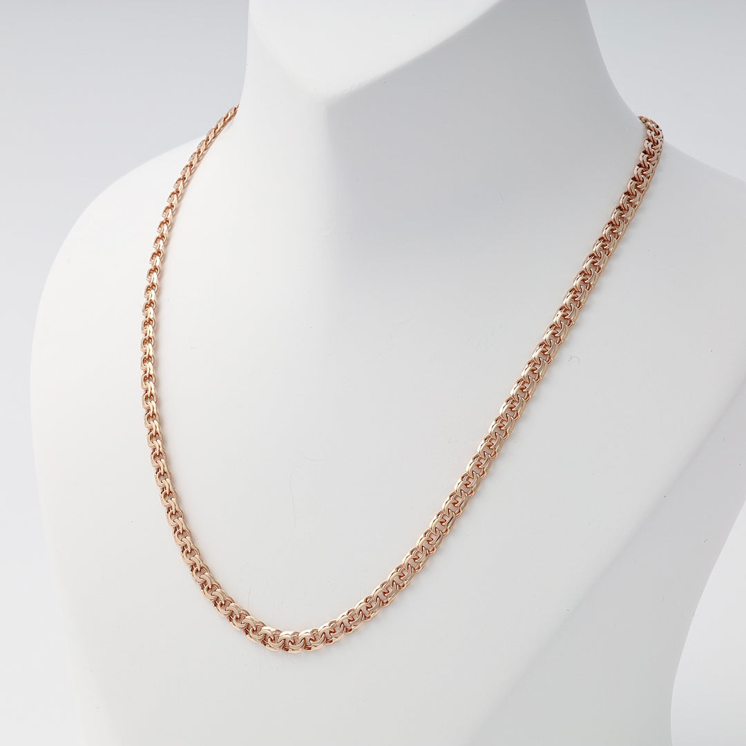 Rose gold rope chain necklace displayed on a white jewelry bust, classic chain link jewelry, rose gold chain.