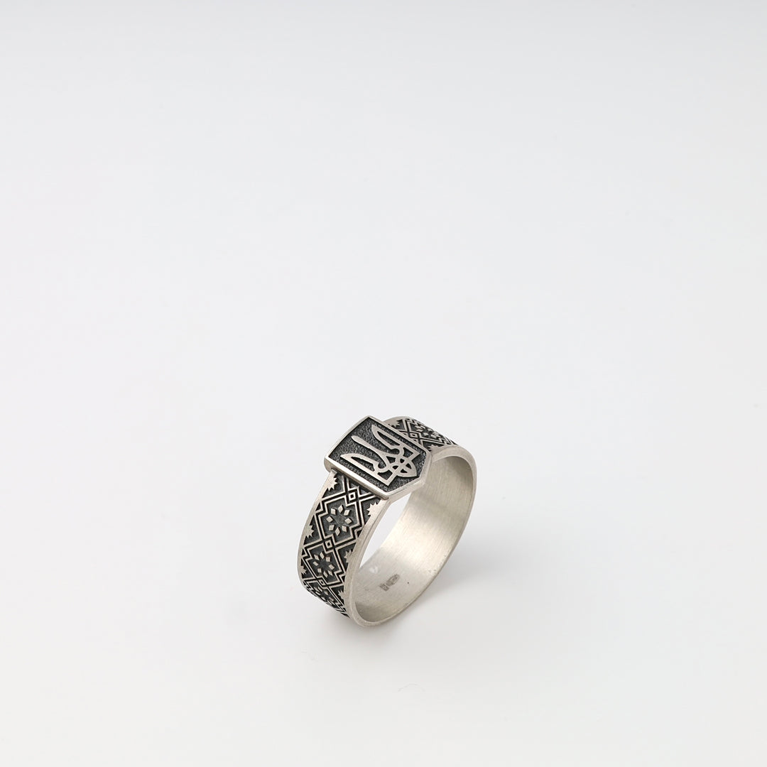 Sterling silver ring with Ukrainian trident and folk pattern, ethnic band style Ukrainian Jewelry for men’s silver ring shoppers.