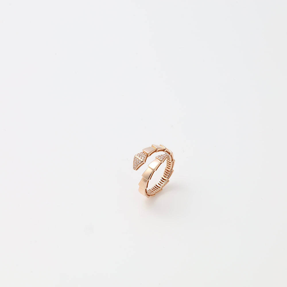 Rose gold ring with geometric arrow motif and tiny crystals on white background, 14k gold Ukrainian Jewelry, stackable ring gift.
