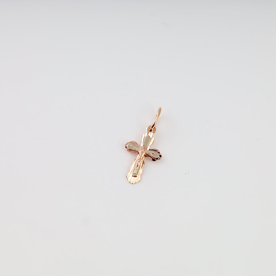 Gold cross pendant with polished details on a plain background, Christian necklace charm, Ukrainian Jewelry, religious gold jewelry.