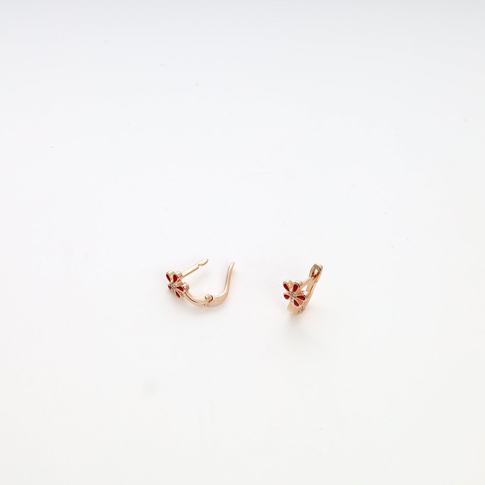 Rose gold earrings with small red enamel flower charms on white background, delicate Ukrainian Jewelry, gold flower earrings for girls.