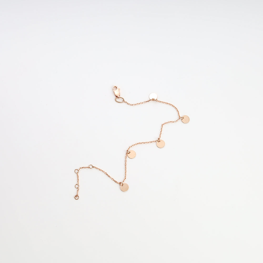 Delicate 14k gold chain bracelet with small disc charms, minimalist coin anklet style, Ukrainian Jewelry for everyday gold bracelet shoppers.