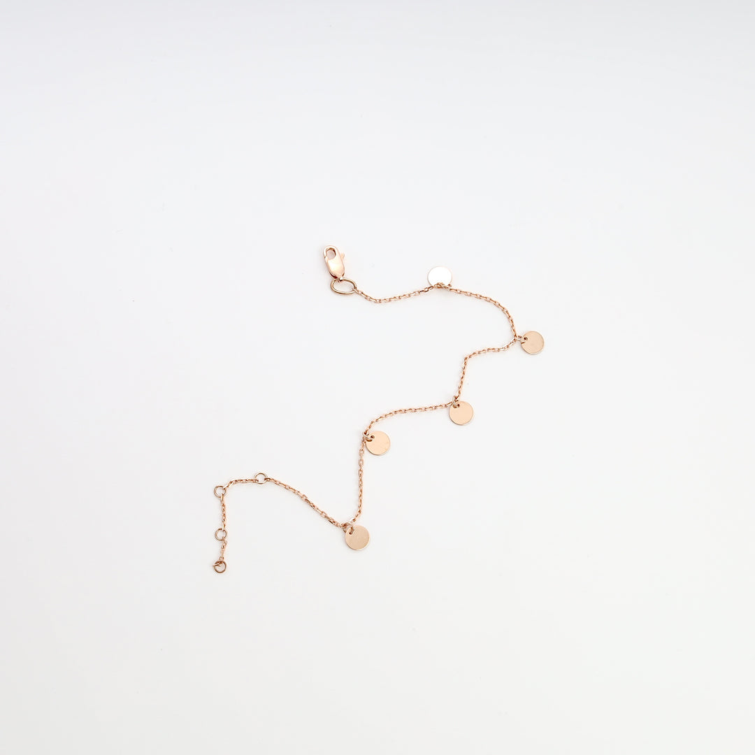 Delicate 14k gold chain bracelet with small disc charms, minimalist coin anklet style, Ukrainian Jewelry for everyday gold bracelet shoppers.