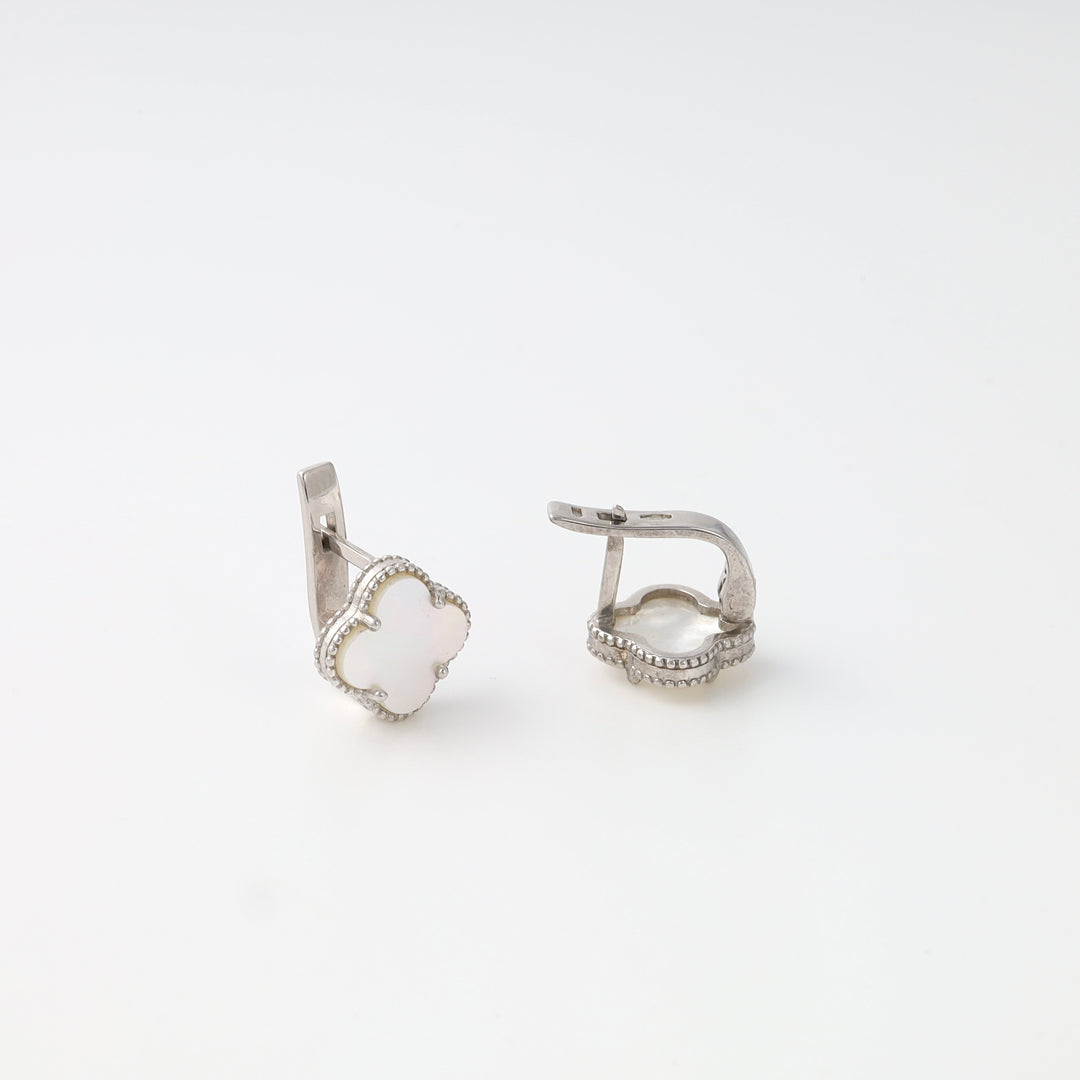 Sterling silver clover huggie earrings with white inlay on white background, Ukrainian Jewelry, silver earrings gift for women.