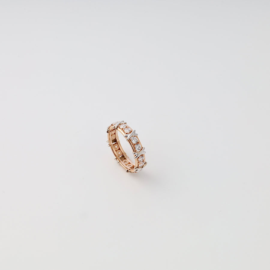 14k gold eternity ring with round cubic zirconia stones in prong setting on white background, Ukrainian Jewelry, bridal wedding band.