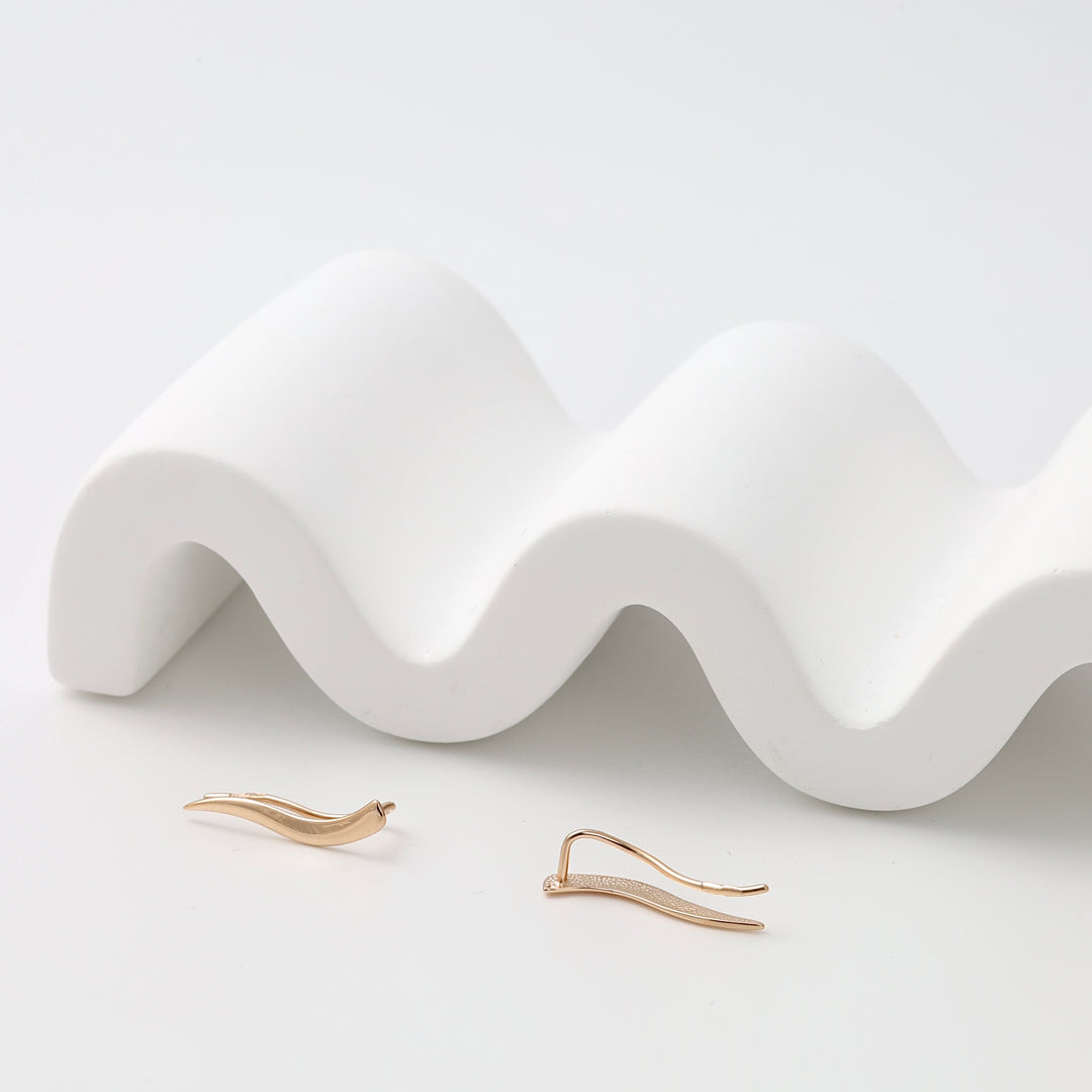 14k gold wave climber earrings with minimalist bar design on white display, Ukrainian Jewelry, modern gold earrings for women.