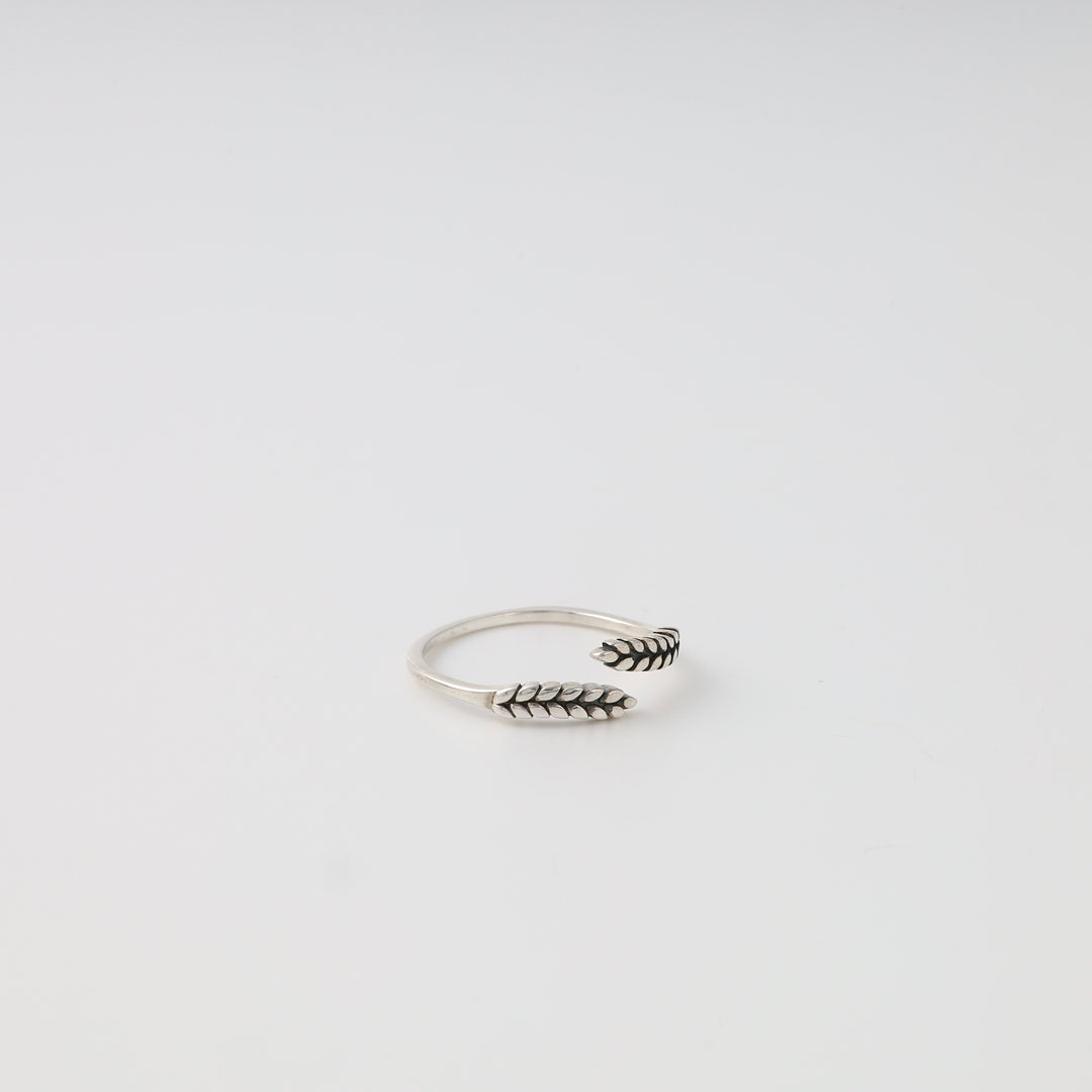 Sterling silver open wheat ring with leaf motif on white background, minimalist Ukrainian Jewelry, silver stacking ring, boho ring.