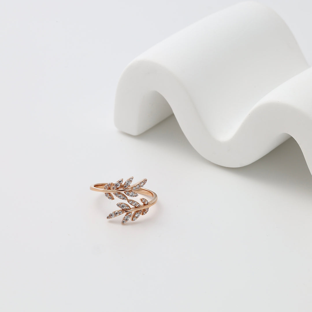 Gold leaf branch ring with clear stones on white display, delicate fashion jewelry, Ukrainian Jewelry, dainty gold ring gift.