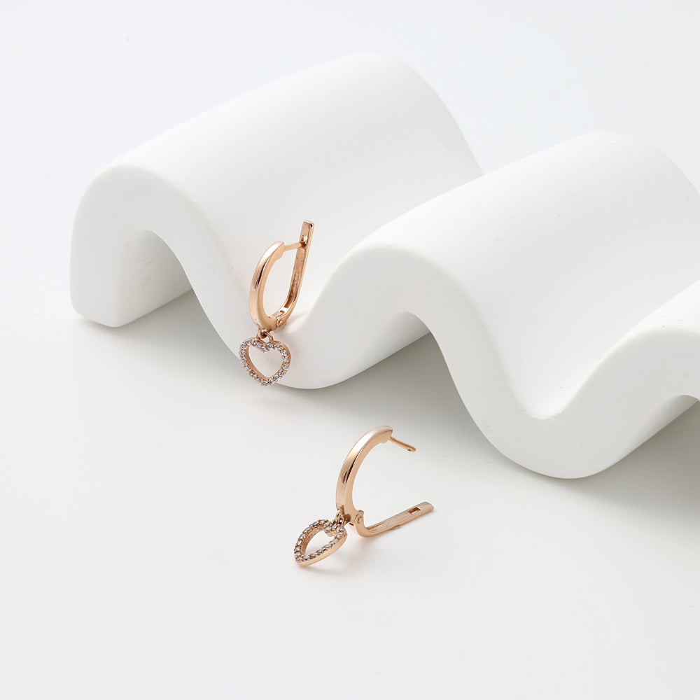 14k gold heart hoop earrings with small crystals on white display, romantic dangle Ukrainian Jewelry, gold heart earrings gift.