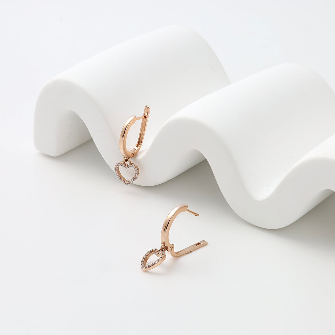 14k gold heart hoop earrings with small crystals on white display, romantic dangle Ukrainian Jewelry, gold heart earrings gift.