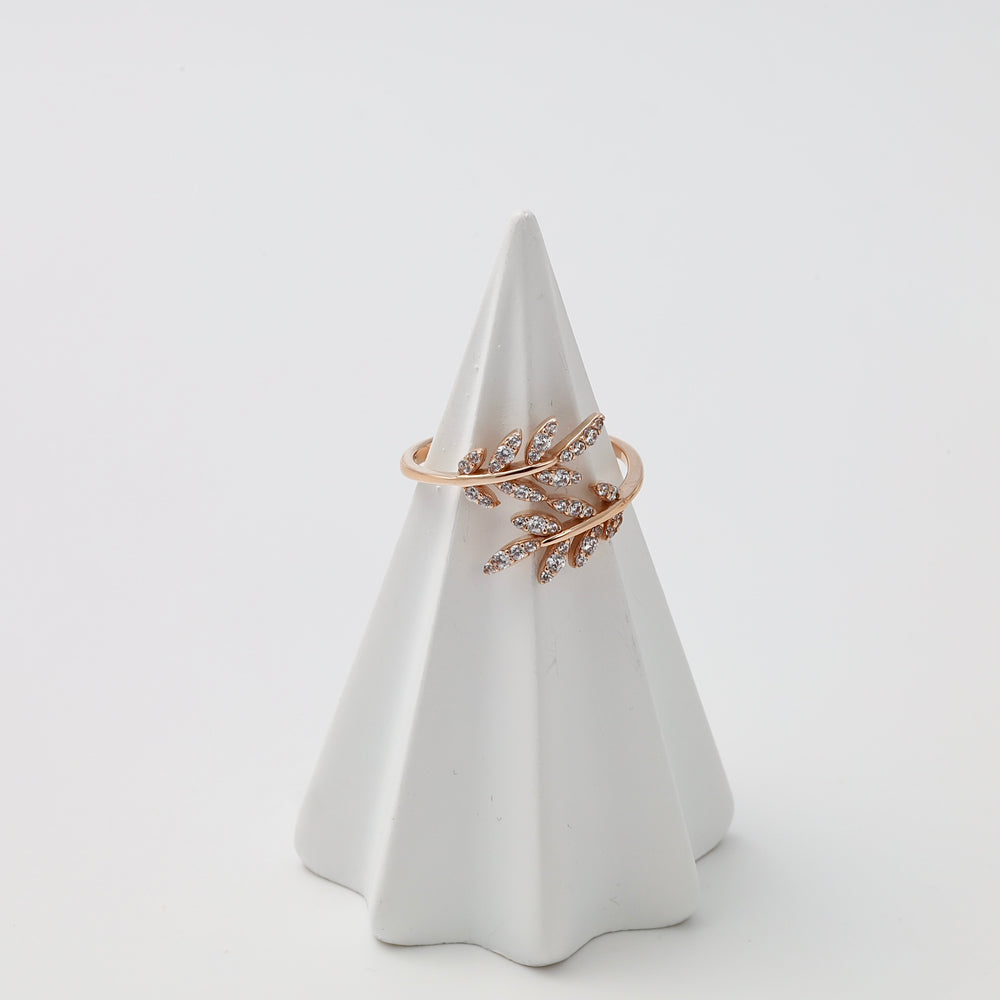 Rose gold ring with cubic zirconia leaf design on display cone, 14k gold fashion ring, Ukrainian Jewelry, delicate gold leaf ring.