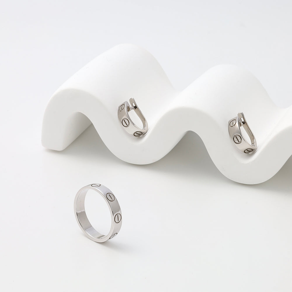 Sterling silver hoop earrings and matching band ring with screw motif on white display, Ukrainian Jewelry, silver ring set gift.