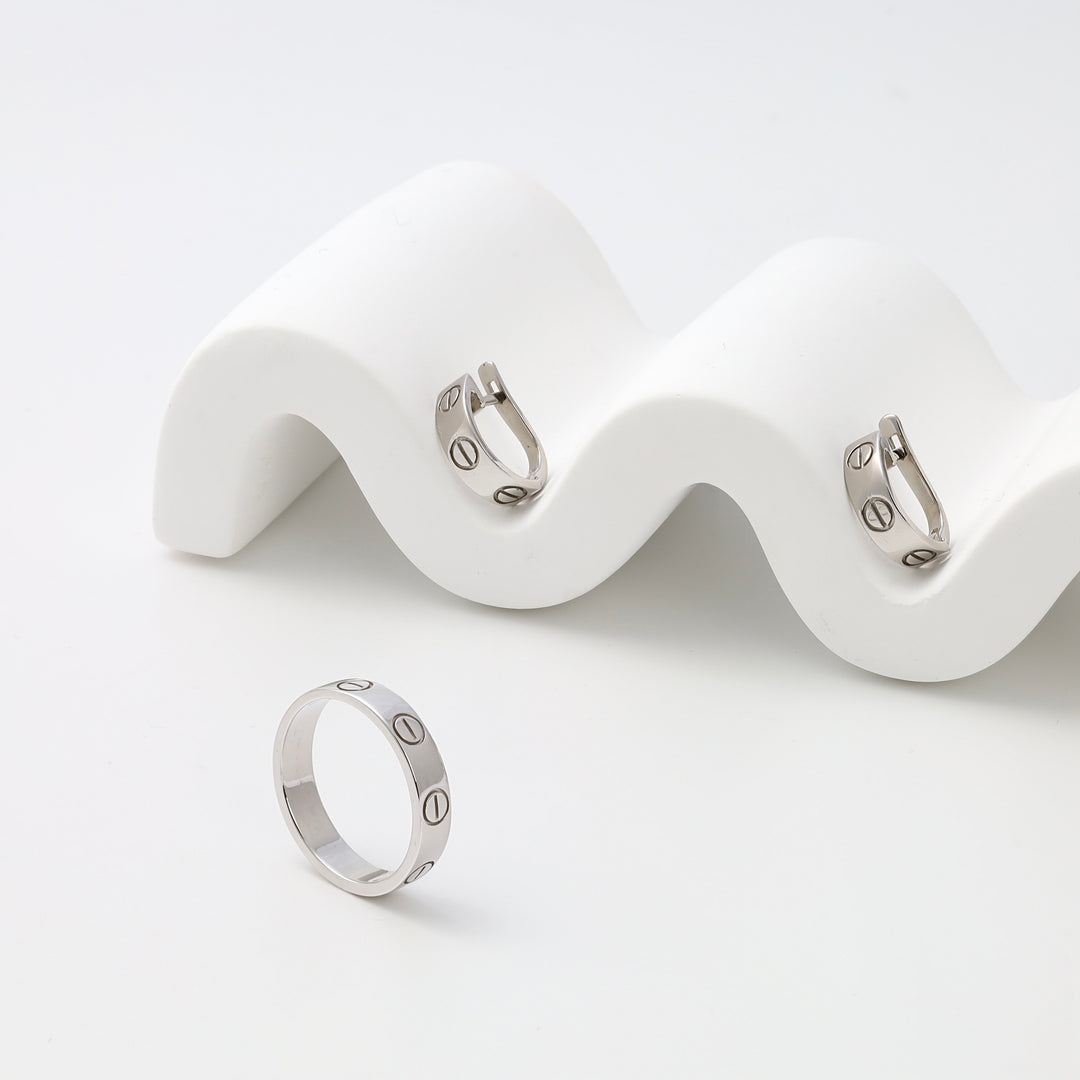 Sterling silver hoop earrings and matching band ring with screw motif on white display, Ukrainian Jewelry, silver ring set gift.