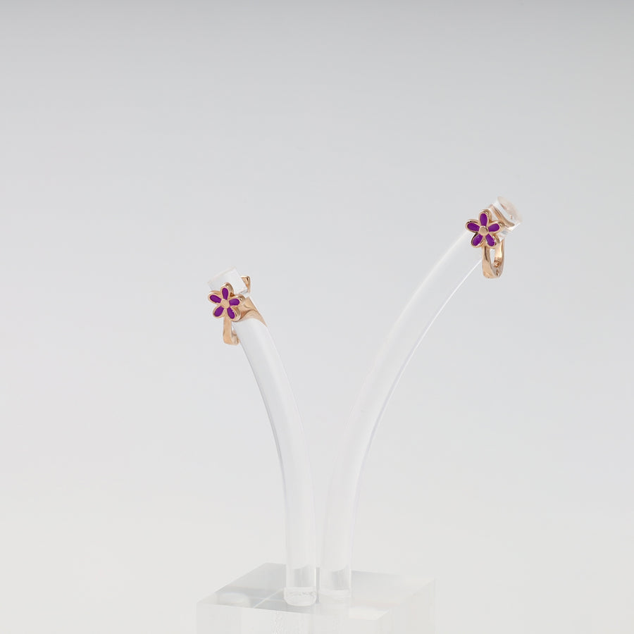 Pair of 14k gold flower hoop earrings with purple enamel petals on display, Ukrainian Jewelry, kids gold earrings gift.
