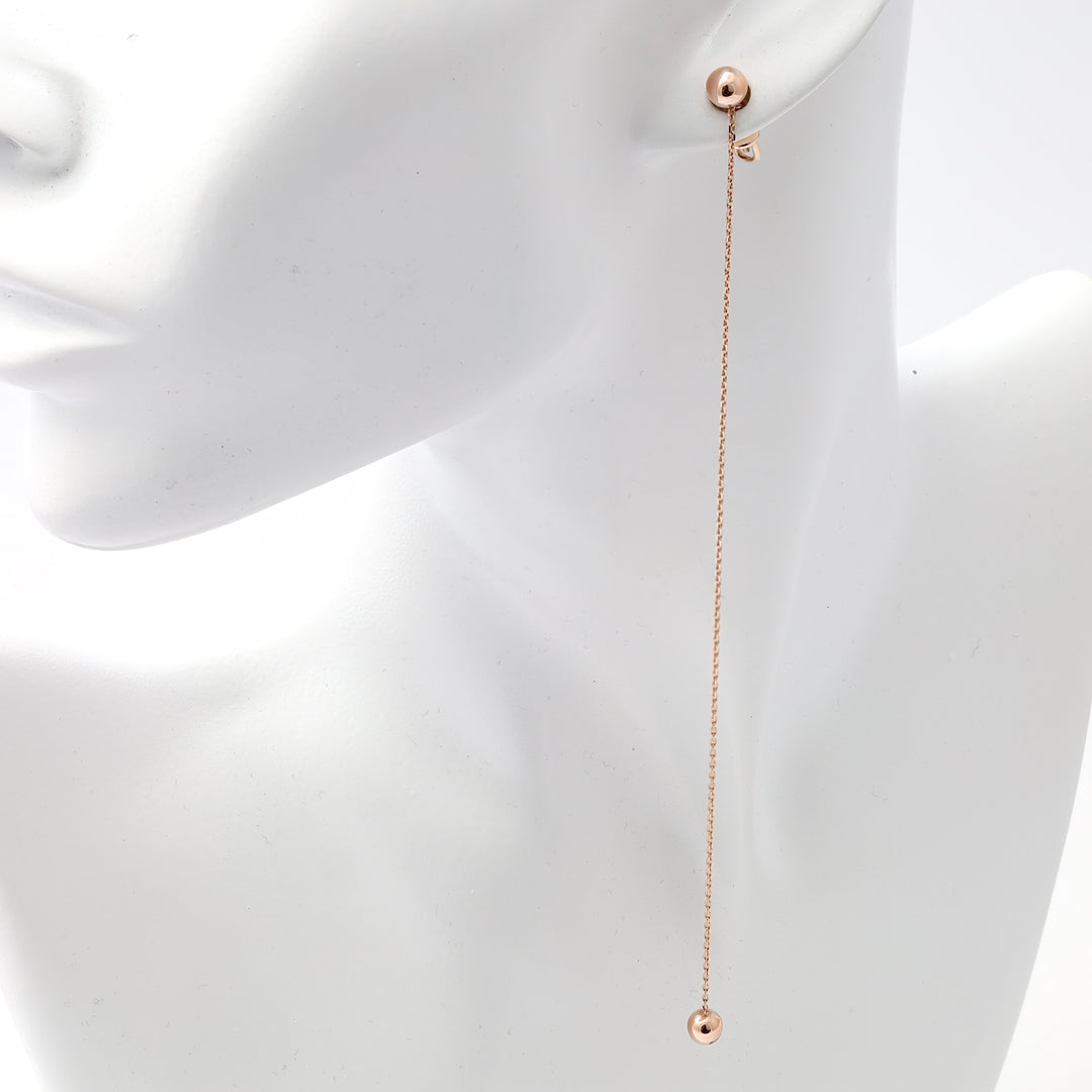 Single 14k gold threader earring with ball drops shown on mannequin, minimalist drop earring Ukrainian Jewelry for women.