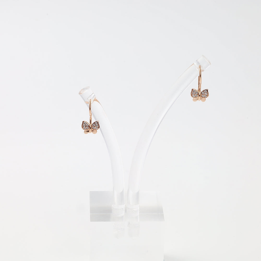 Rose gold butterfly hoop earrings with crystal accents on display stand, 14k gold Ukrainian Jewelry, dainty gold earrings for women.