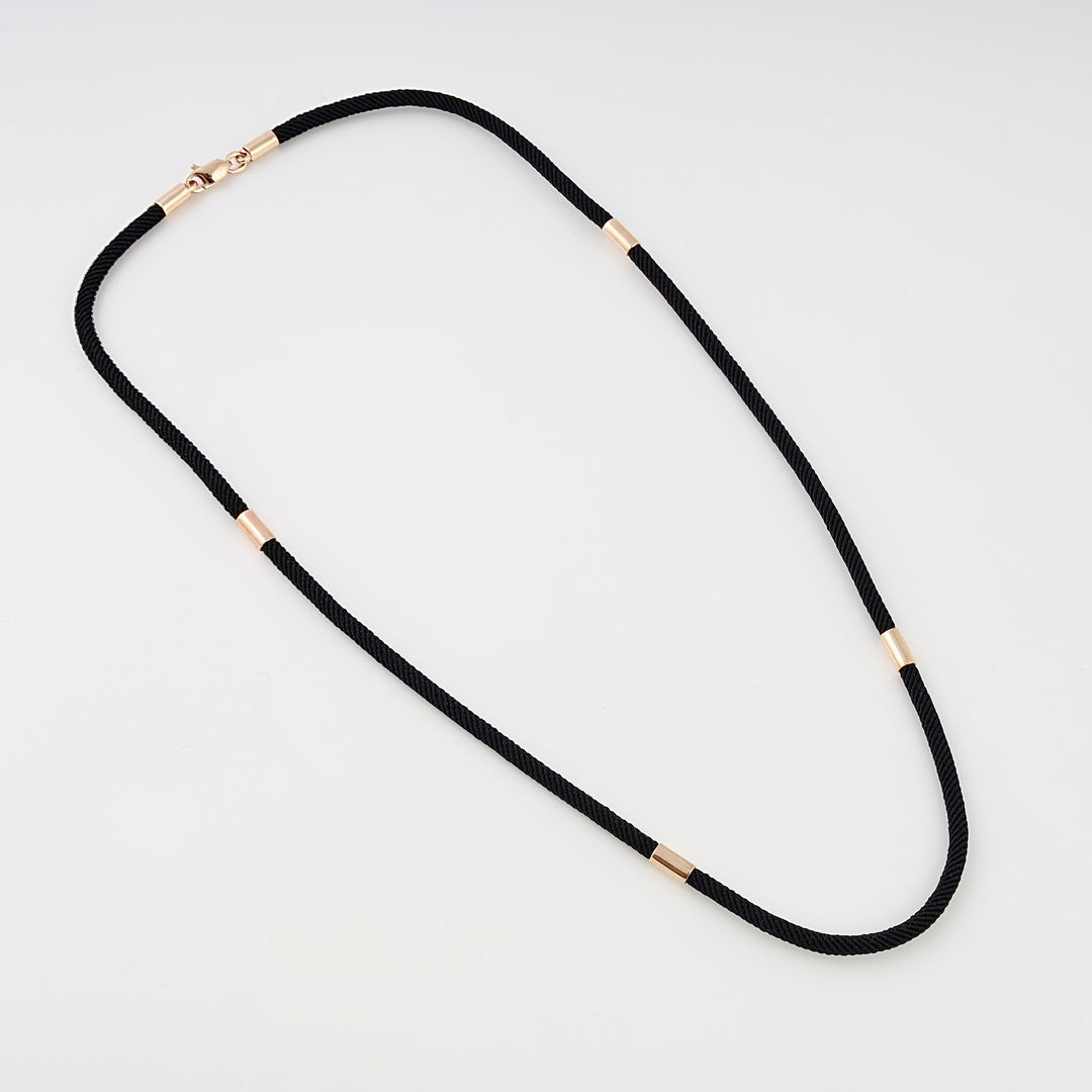 Black cord necklace with small 14k gold tube accents, minimalist chain jewelry, Ukrainian Jewelry for everyday necklace layering.