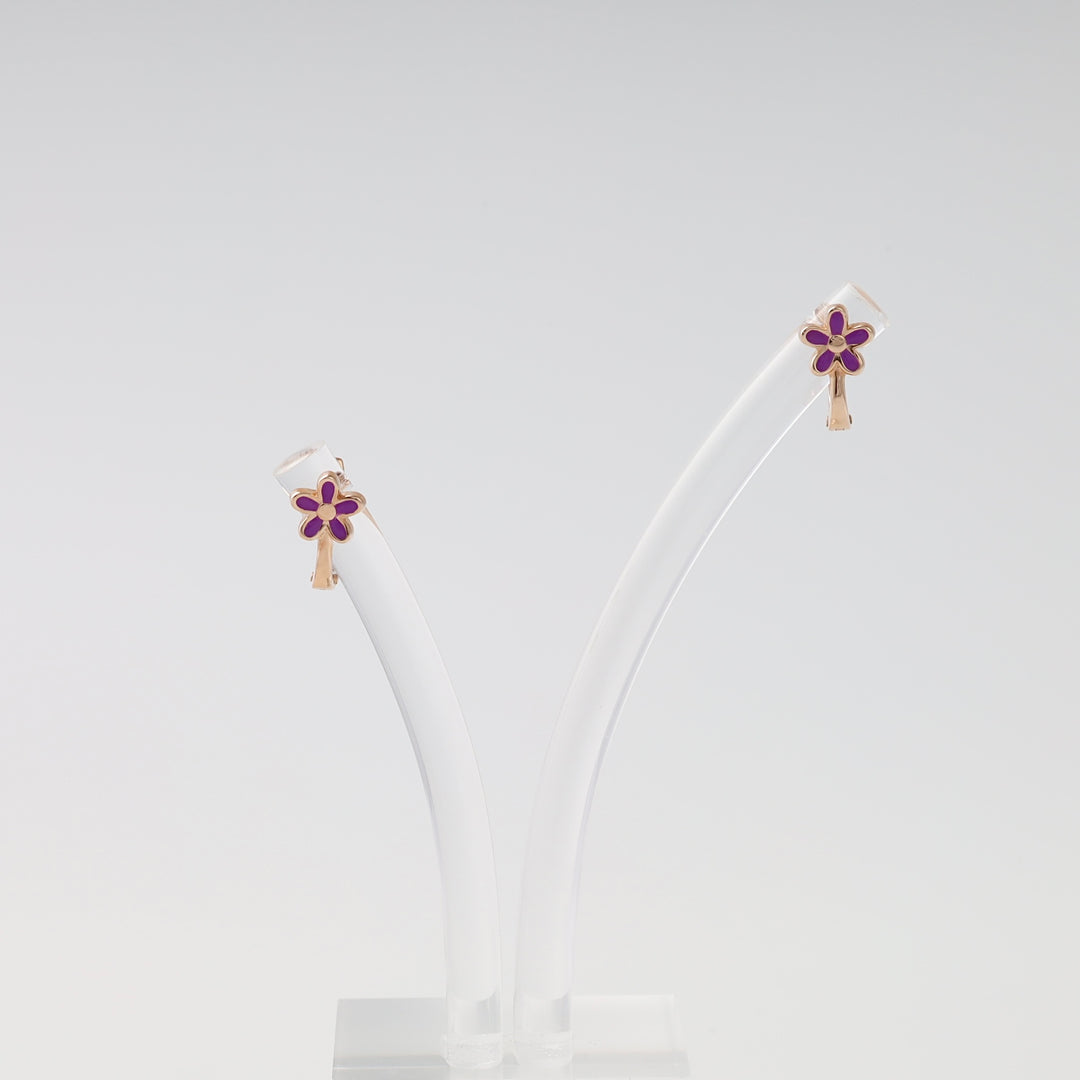 14k gold purple enamel flower stud earrings with small dangle charms on display, Ukrainian Jewelry, kids gold earrings gift.