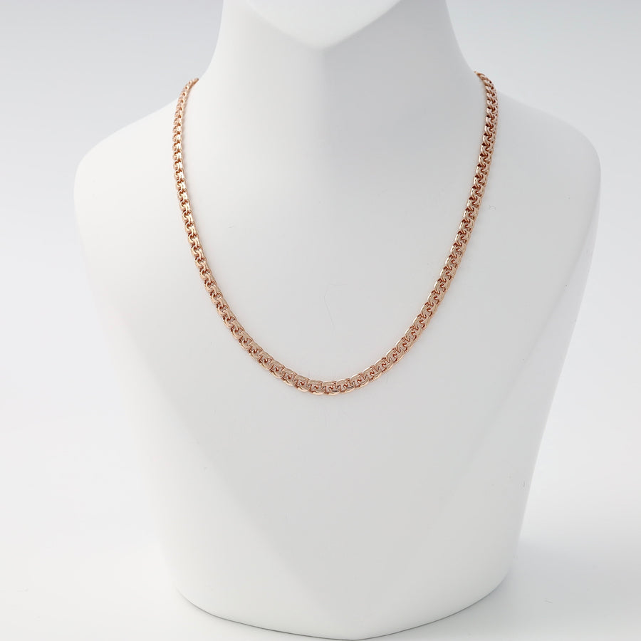 Rose gold chain necklace with a rounded box link pattern displayed on a white jewelry bust.