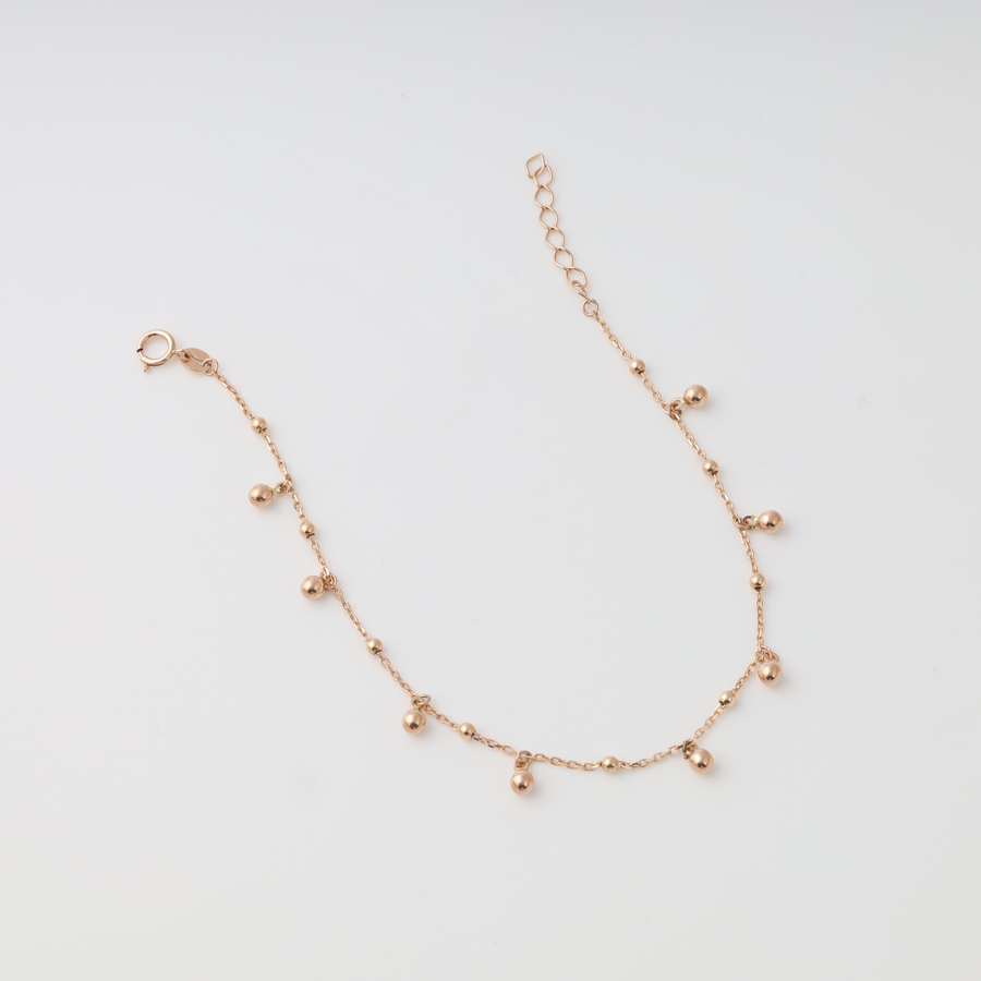 Delicate 14k gold chain bracelet with small bead charms, adjustable clasp, minimalist Ukrainian Jewelry for women.