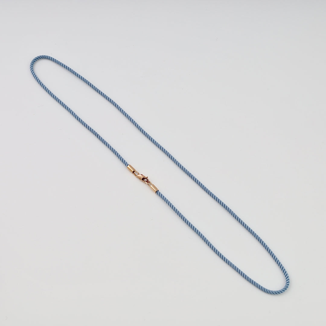 Blue cord necklace with small gold clasp, minimalist pendant chain, Ukrainian Jewelry for everyday gold necklace buyers.