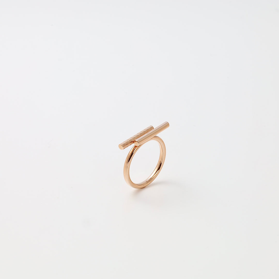 Minimalist 14k gold ring with horizontal bar design on white background, modern stackable Ukrainian Jewelry for women.