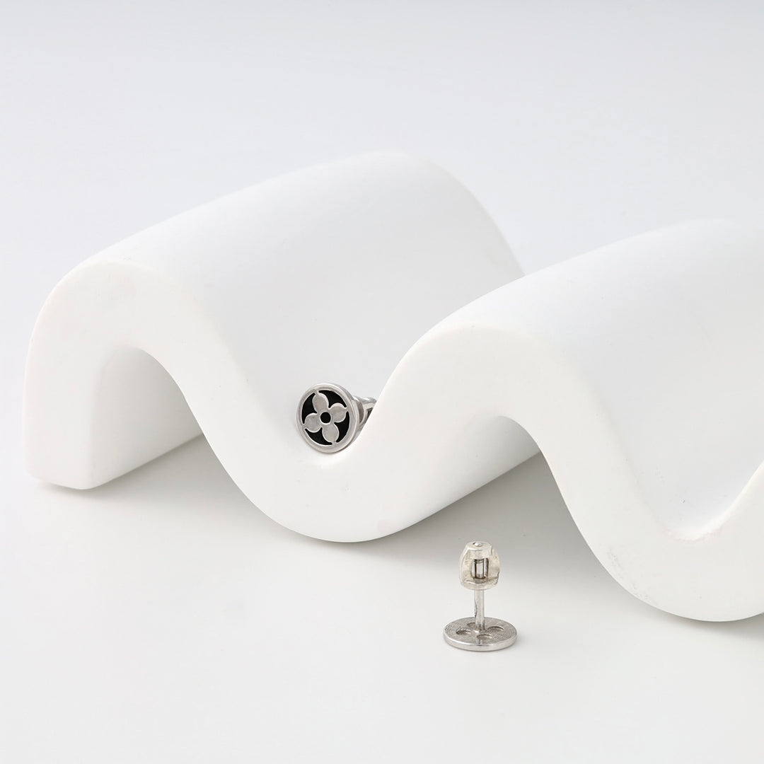 Sterling silver stud earrings with black enamel clover design shown on white display, Ukrainian Jewelry, silver stud earrings gift.