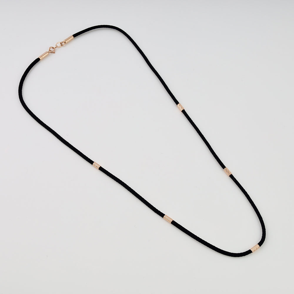 Black cord necklace with small 14k gold tube accents and clasp, minimalist Ukrainian Jewelry, simple gold chain necklace.
