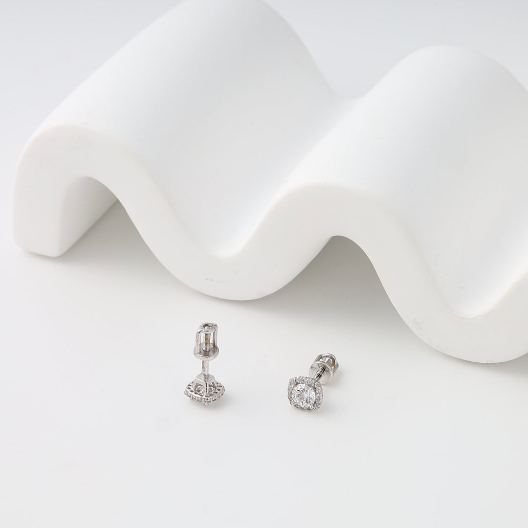 Sterling silver stud earrings with cushion-cut clear stones, solitaire diamond look, Ukrainian Jewelry for everyday minimalist style.