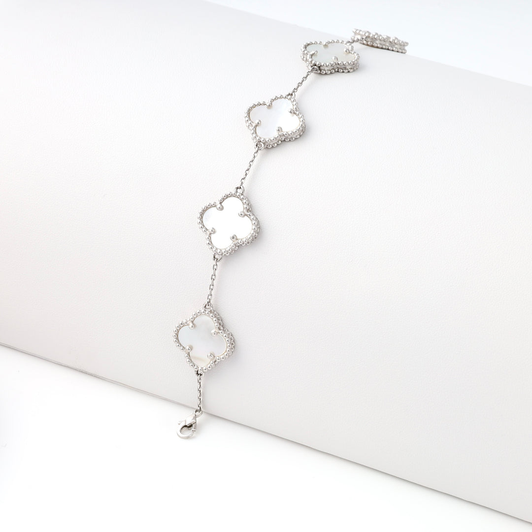 Sterling silver bracelet with clover charms on a display roll, Ukrainian Jewelry, delicate silver chain bracelet gift for women.