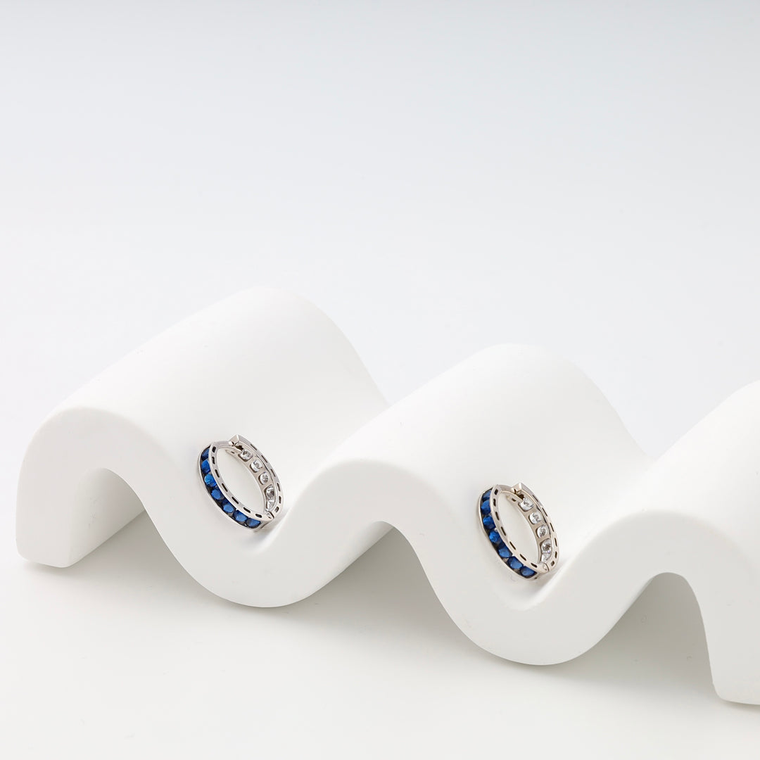 Sterling silver hoop earrings with blue stones displayed on white stand, Ukrainian Jewelry silver hoop earrings gift.