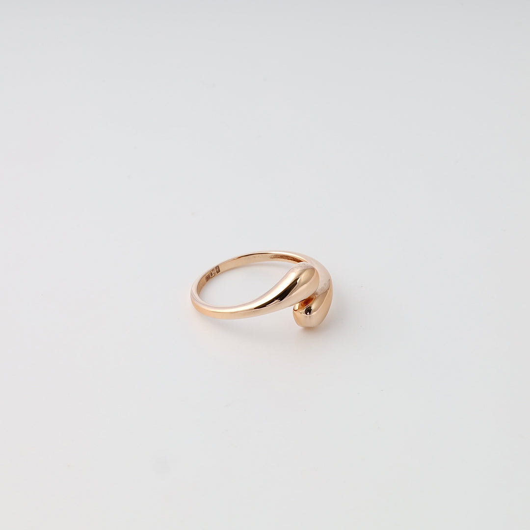 14k gold abstract knot ring on white background, minimalist Ukrainian Jewelry, modern gold ring gift for women.