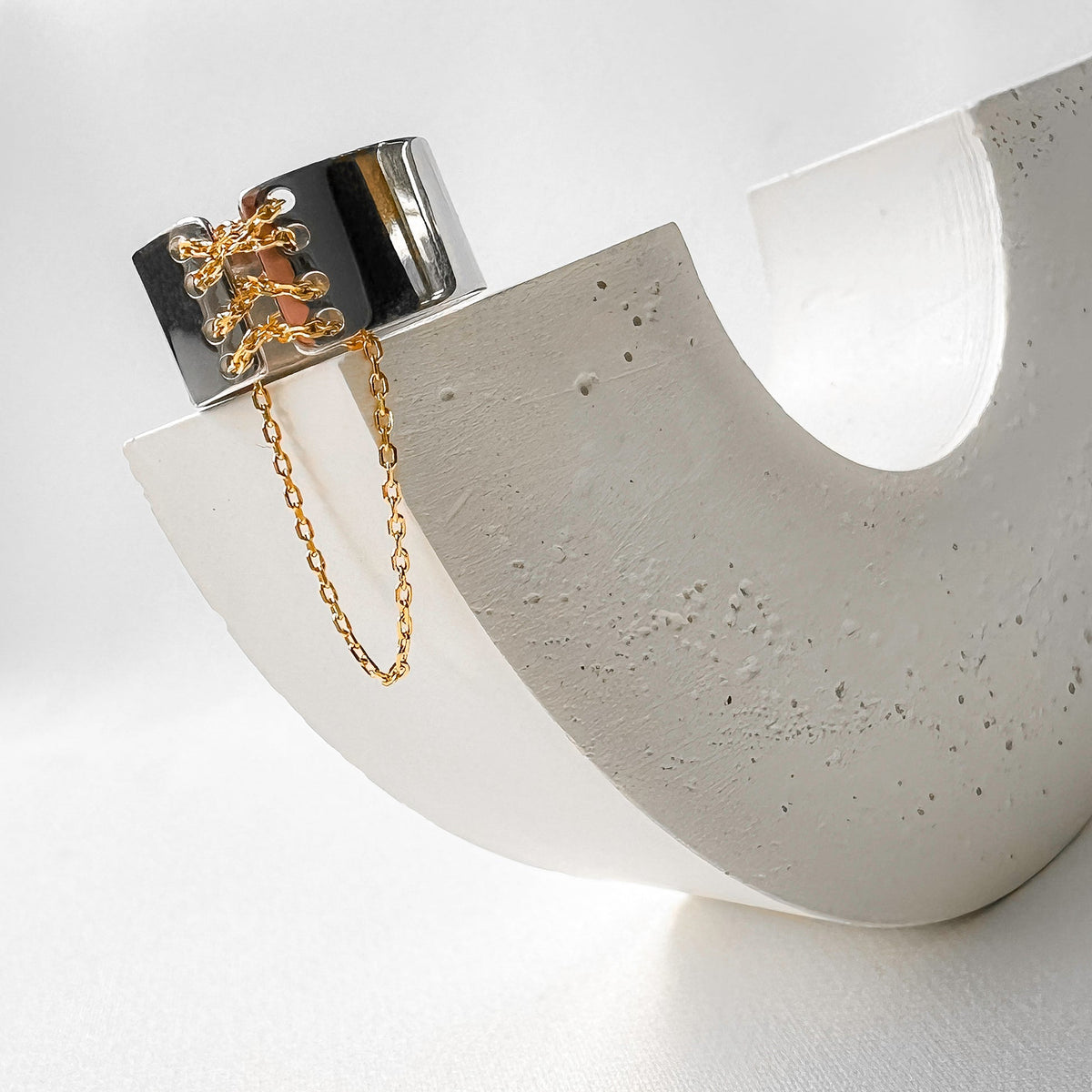 Corset Ring Silver 925 with Gold Chain on concrete display - Ukrainian Jewelry