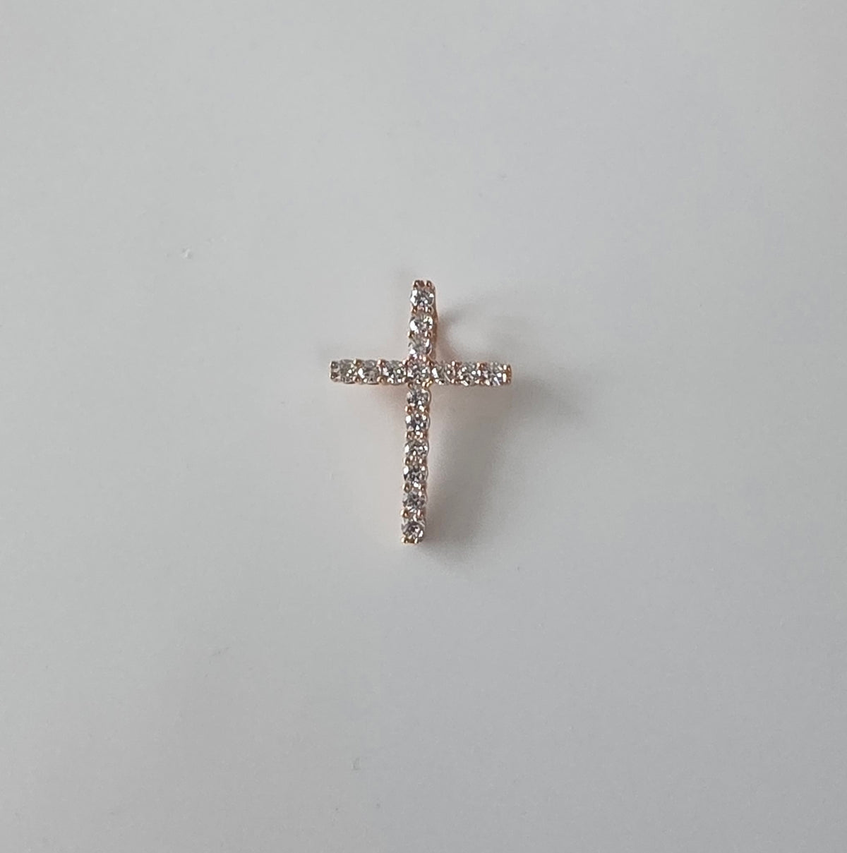14K rose gold cross pendant set with a single row of cubic zirconia, Ukrainian Jewelry
