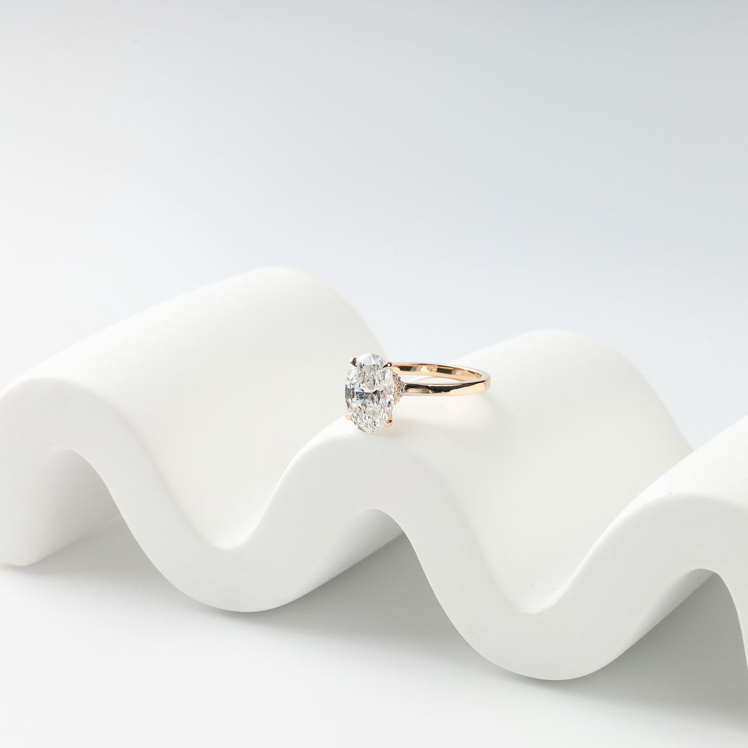 Rose gold 14K With 1 Oval lab Diamond 2 ct. F/VVS2 (IGI) and 12 small Lab Diamonds | Ukrainian Jewelry