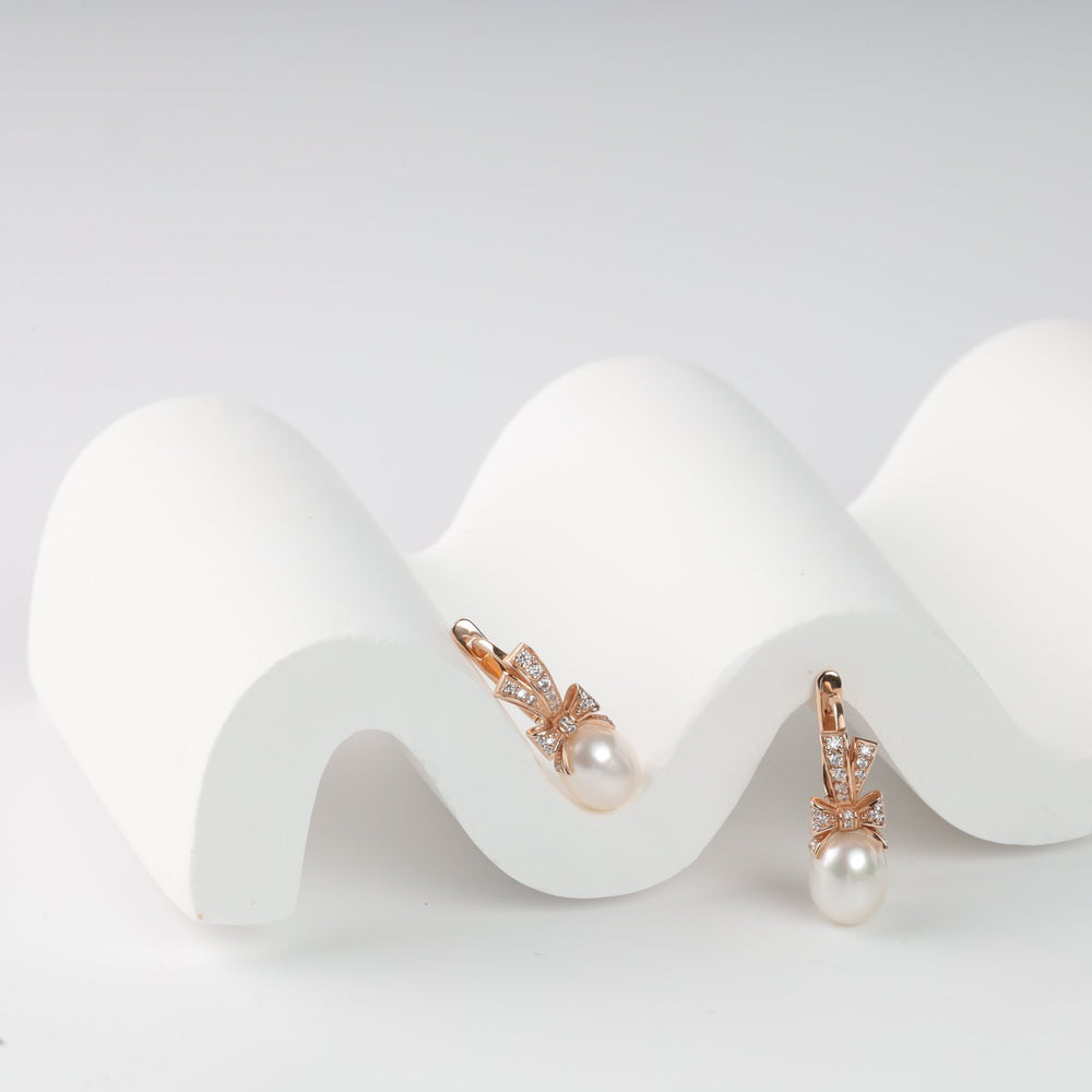 Золоті сережки Бантики з перлинами та кубічним цирконієм - Ukrainian Jewelry